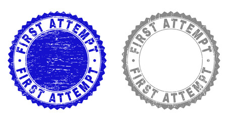 Grunge FIRST ATTEMPT stamp seals isolated on a white background. Rosette seals with grunge texture in blue and grey colors. Vector rubber stamp imprint of FIRST ATTEMPT title inside round rosette.
