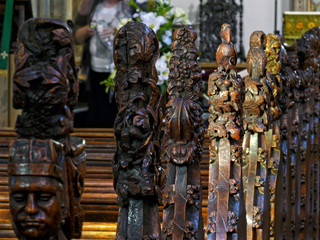Fototapeta premium Poppyhead finials on pews in Rothwell Holy Trinity Church, Leeds