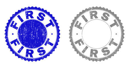 Grunge FIRST stamp seals isolated on a white background. Rosette seals with distress texture in blue and grey colors. Vector rubber stamp imitation of FIRST title inside round rosette.