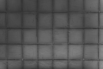 Dark gray tiles grunge textures background