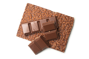 closeup of milk puffed rice chocolate blocks on white background
