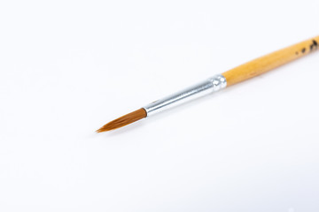 Painting brushes. Drawing tools, paint brushes on white background, copy space, top view