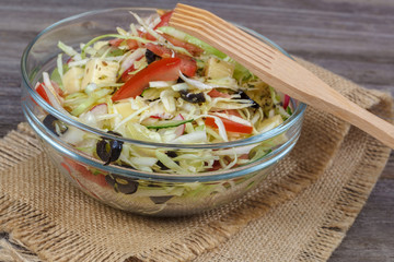 Fresh vegetables and vegetable salad in dishes