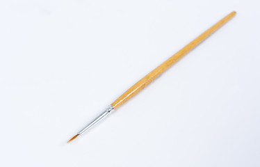 Painting brushes. Drawing tools, paint brushes on white background, copy space, top view