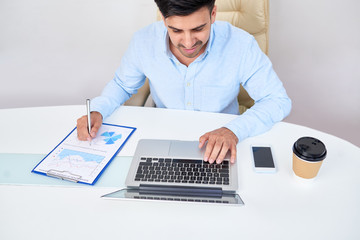 Businessman working on financial report