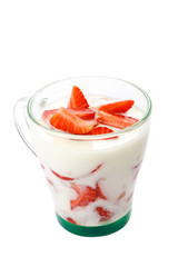 Fresh strawberry with sour cream in a bowl