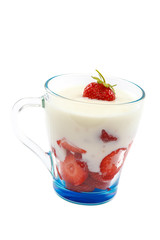 Fresh strawberry with sour cream in a bowl