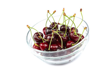 Fruits of a sweet cherry in a glass bowl