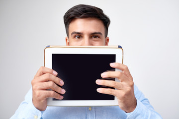 Crazy businessman with digital tablet