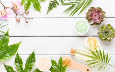 Beauty and fashion concept with spa set on pastel rustic wooden background.