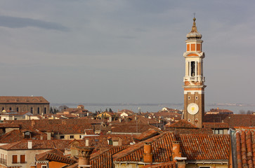 Fototapeta na wymiar Venetian Roofs and Bell Tower of Santi Apostoli Church
