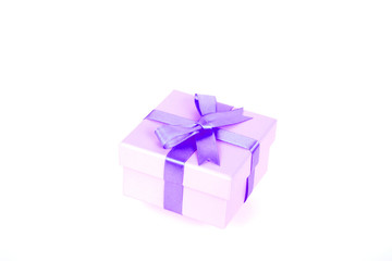 gift box with purple bow and white background