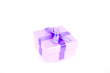 gift box with purple bow and white background