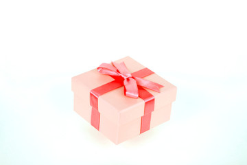 gift box with red bow and white background