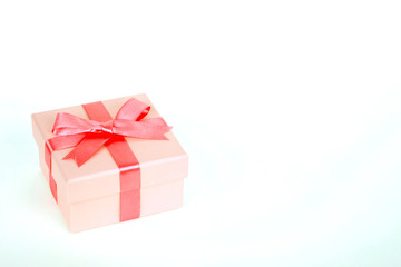 gift box with red bow and white background