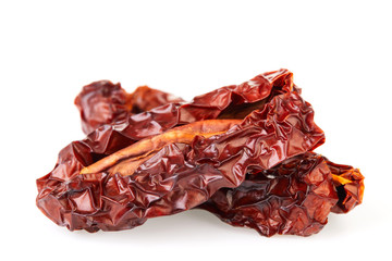 Sun dried tomatoes close up macro isolated on white background