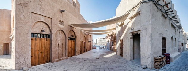 DUBAI, UAE - December 13: View of traditional arabic buildings at Al Fahidi Historical District,...