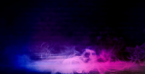 Background of an empty dark room. Empty walls, neon light, smoke, smog. Blue and pink smoke, ultraviolet light in the dark.