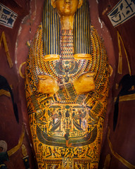 Cairo Egypt December 5, 2018: Color drawings based on the mythology of ancient on Egypt sarcophagus...