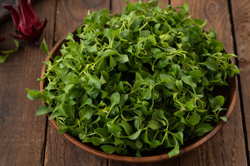 Watercress in wood bowl