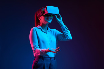 Positive businesswoman in vr headset