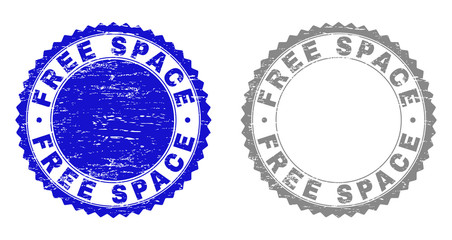 Grunge FREE SPACE stamp seals isolated on a white background. Rosette seals with grunge texture in blue and gray colors. Vector rubber watermark of FREE SPACE tag inside round rosette.