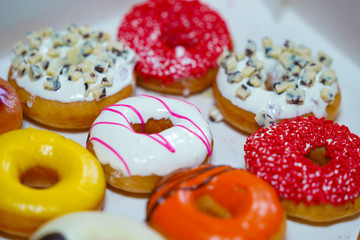 colorful donuts. fat and unhealthy food concept.