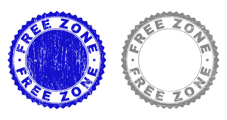 Grunge FREE ZONE stamp seals isolated on a white background. Rosette seals with grunge texture in blue and grey colors. Vector rubber stamp imprint of FREE ZONE label inside round rosette.