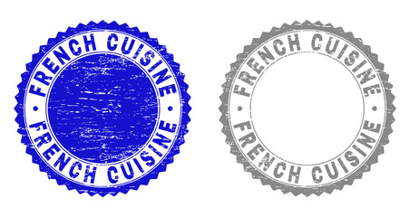 Obraz premium Grunge FRENCH CUISINE stamps isolated on a white background. Rosette seals with grunge texture in blue and grey colors. Vector rubber stamp imitation of FRENCH CUISINE caption inside round rosette.