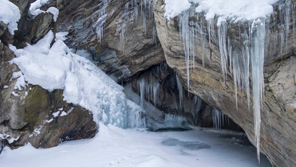 Fototapeta na wymiar Frozen cave with icicles, Austria