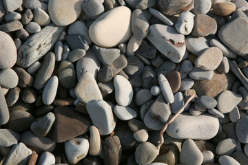 pebbles on the beach, seamless stone texture.
