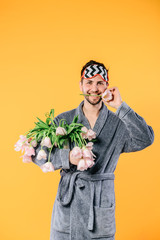 bouquet of tulips in hand on white background close-up. Concept 8 March, international women's day. Valentine's Day. Smart young man at Valentine's day. Concepts. Love - Image