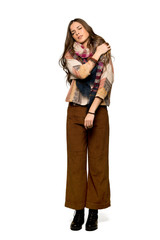 Full-length shot of Young hippie woman suffering from pain in shoulder for having made an effort on isolated white background