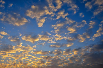 Beautiful colorful cloudy sunset sky as background