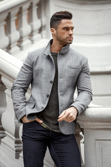 Handsome man in gray jacket