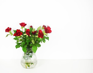 Red roses on white background copy space