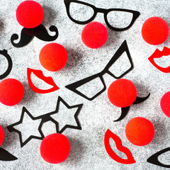 Red Nose Day, red noses with glasses, moustache. Toned deep negative.