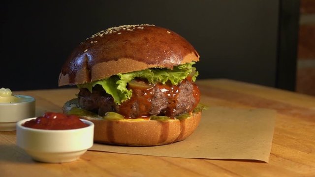 Turntable Hamburger -  Slow motion - beef,tomato,cheese,lettuce 