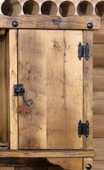 Small closed wooden cabinet door