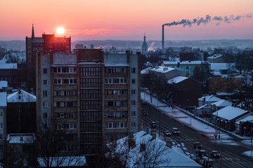 Beautiful winter sunset on one of the roofs in Daugavpils.