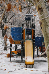Frozen children playground after freezing rain