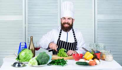 Prepare ingredient for cooking. According to recipe. Useful for significant amount of cooking methods. Basic cooking processes. Man master chef or amateur cooking food. Sharp knife chopping vegetable