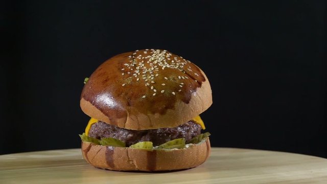 Turntable Hamburger -  Slow motion - beef,tomato,cheese,lettuce 