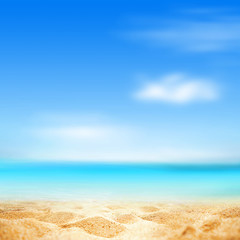Fototapeta na wymiar Summer background, nature of tropical golden beach with blue sky and white clouds. Golden sand beach close-up and defocused landscape. Copy space, summer vacation concept.