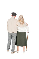 back view of senior couple standing isolated on white