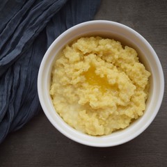 Delicious millet porridge in a white plate.
