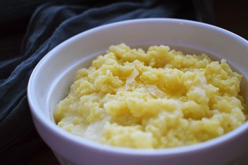 Delicious millet porridge in a white plate.