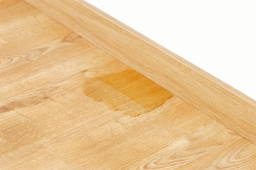 wood laminate parquet with water leak