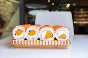 Sushi sets on a glass showcase, close up