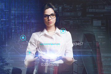 The concept of business, technology, the Internet and the network. A young entrepreneur working on a virtual screen of the future and sees the inscription: Recommendation